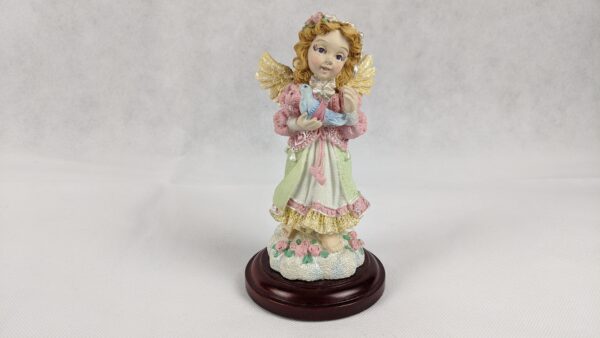 Angel Holding Bluebird On Wooden Base